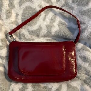 HOBO Red Mini Bag with Glossy Finish and Strap.
